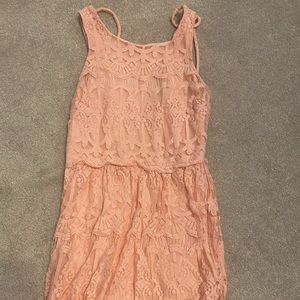 Dress, almost to the knee.